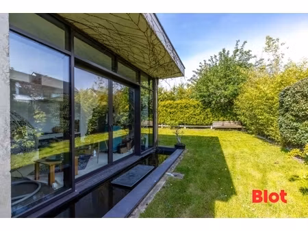 a vendre chez blot à le rheu landes d'apigné maison d'architecte 178m2 de plain pied 4chs 