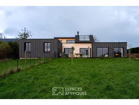 maison contemporaine avec vue dégagée sur la rivière et la vallée