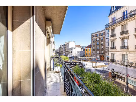 appartement 4 pièce(s) 97.58 m2 avec balcon -cave et parking