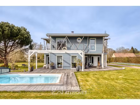 maison contemporaine en ossature bois avec piscine