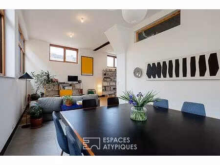 ancienne serrurerie réhabilitée en loft avec atelier