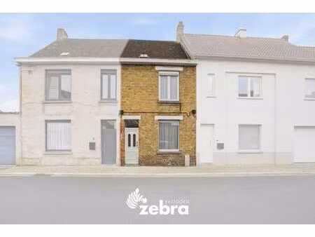 te renoveren woning met tuin op centrale ligging in tielt!