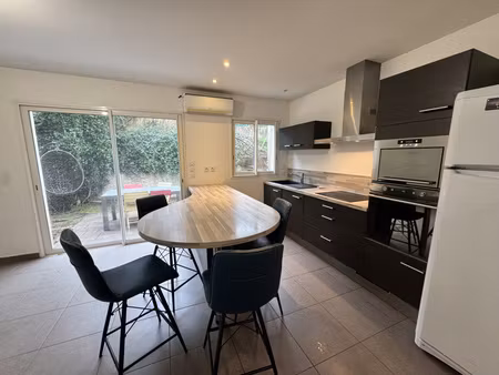 appartement 2 pièces  jardinet  terrasse