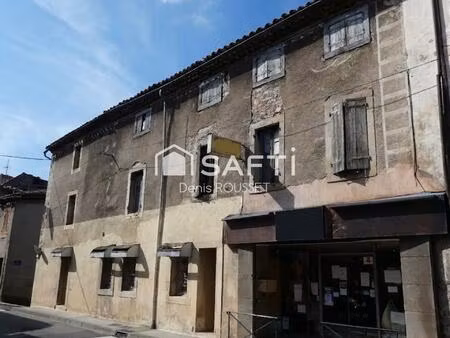 immeuble d'habitation à rénover  idéal investisseur avec deux locaux commerciaux loués en 