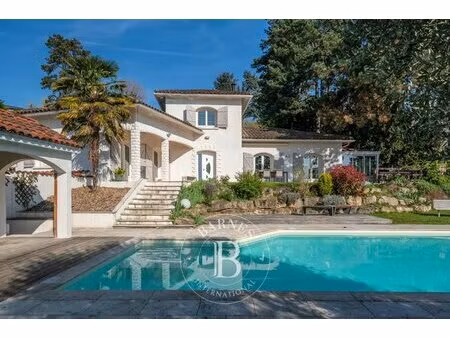 limonest - maison familiale d'environ 172 m² - 4 chambres - terrain 1915 m² - cuisine d'ét