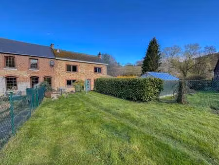 maison en pierre du pays avec garage et beau jardin