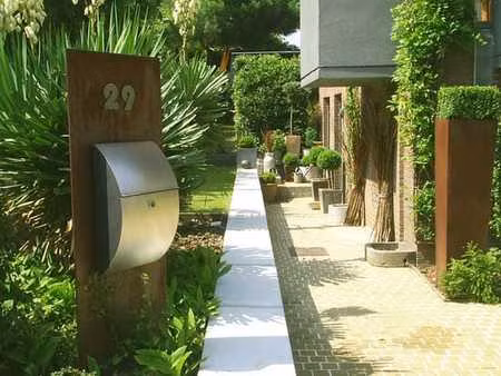 maison 3 façades dans quartier résidentiel