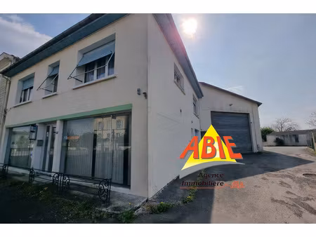 immeuble mixte avec local commercial et habitation environ 2