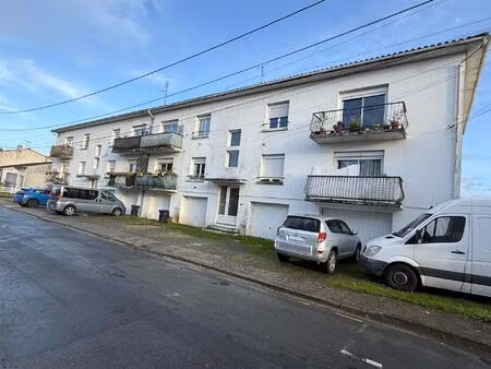 immeuble de rapport de huits appartements et deux terrains à bâtir.