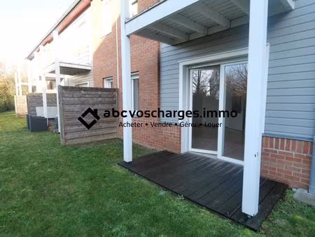 appartement en rc avec terrasse et parking