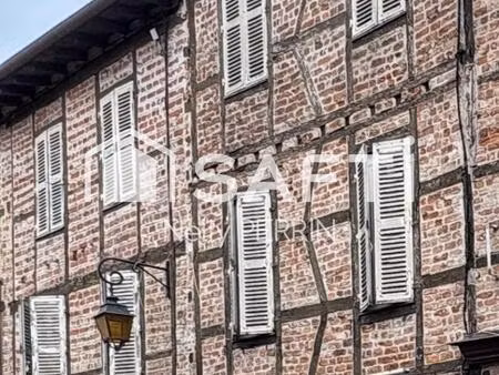 immeuble avec 2 locaux commerciaux  1 appartement a rafraichir et combles amenageables