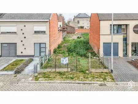 perceel grond te koop te denderleeuw voor gesloten bebouwing