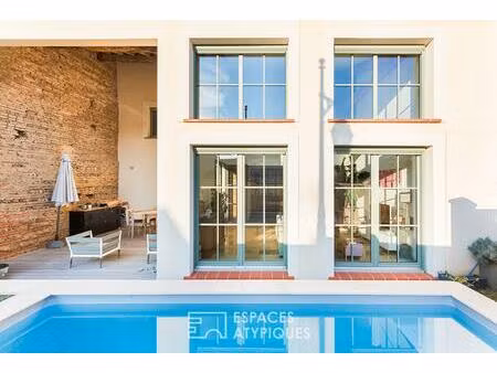 grange rénovée esprit loft avec piscine