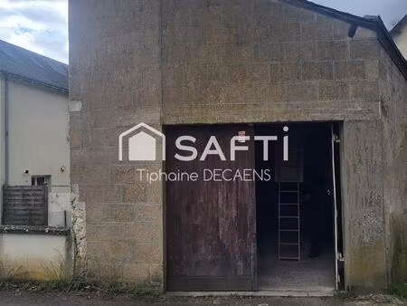 garage avec mezzanine  pouvant devenir un logement