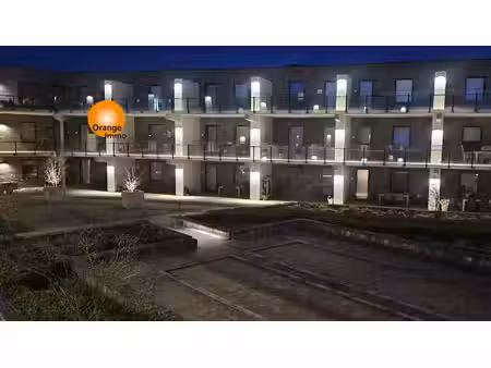 ruim nieuwbouwappartement in het commercieel centrum van eisden.