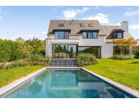 high-end villa en bouwgrond te blanden