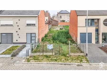 perceel grond te koop te denderleeuw voor gesloten bebouwing