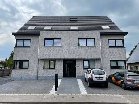 nieuwerkerken - lichtrijk appartement met ruim terras én garage.