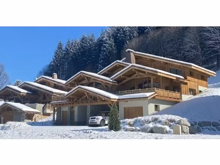 exceptionnel neuf : un magnifique chalet ou deux demi chalets a notre dame de bellecombe..