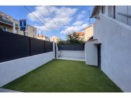 t3 55m2 en rez de jardin .