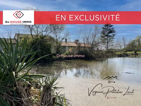 maison de charme 135 m² terrain 2 199 m² vue exceptionnelle sur la rivière cœur du marais