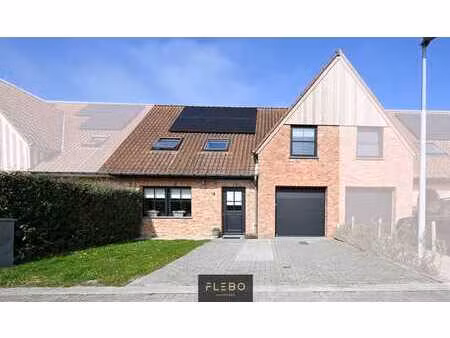 instapklare gezinswoning met tuin en garage in het rustig...