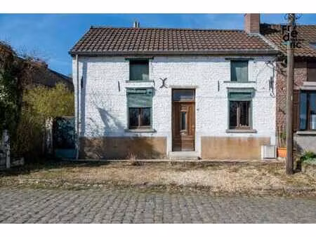 maison avec jardin dans un quartier prisé