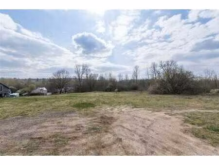 beau terrain à bâtir de 11 ares avec orientation plein sud