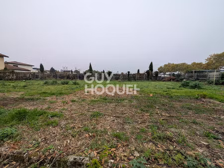 terrain à vendre de 886 m² au centre-ville de décines-charpieu