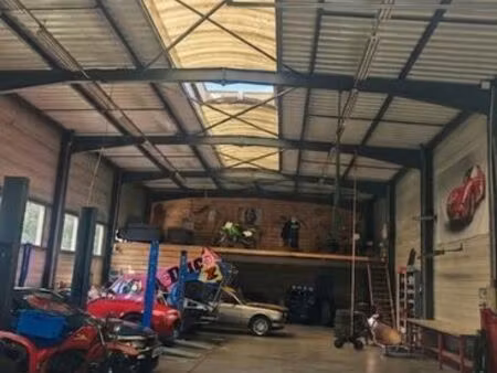 maison + garage automobile sur terrain 2100 m2 bord de départementale