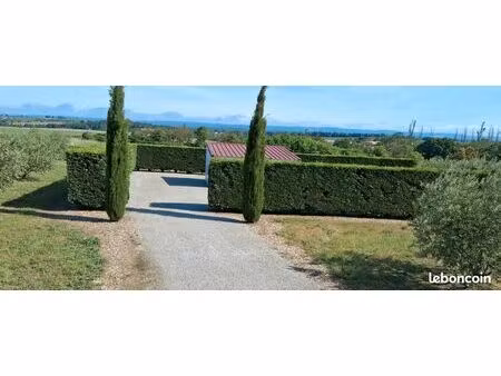 terrain 11 465 m² pezens