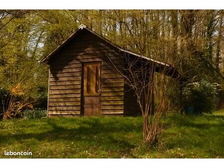 chalet sur terrain boisé