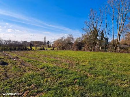 terrain 1000m² attiches