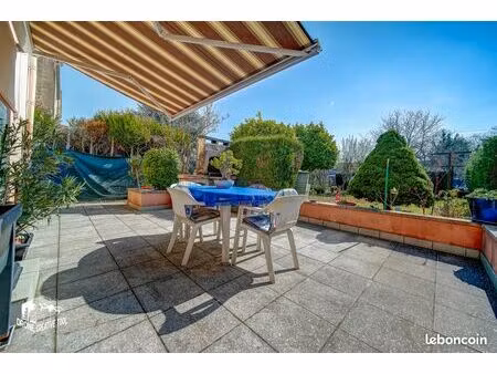 rez de jardin  dans immeuble bourgeois appartement de 89 m²+ annexes cuisine d'été  terras