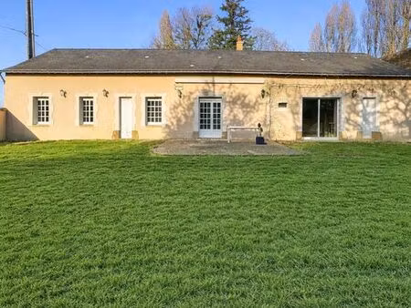 à saint pierre des bois longère de 150m² comprenant 7 pièces  garage de 70m²  atelier de 3