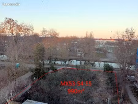 terrain idéalement situé – bord du canal  990m²