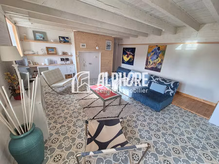 118m² habitable  3 chambres  proximité commerces.