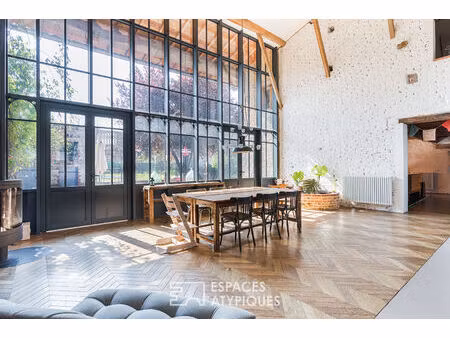 maison de caractère avec verrière cathédrale et piscine à grenade