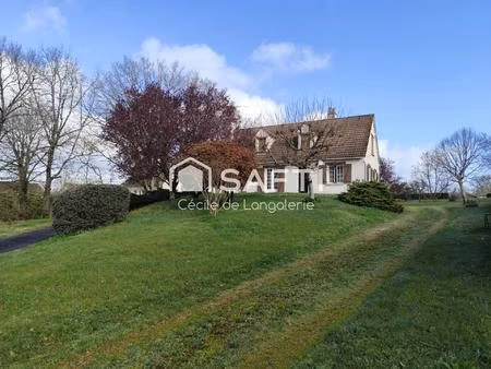 belle maison sur sous-sol avec terrain arbore
