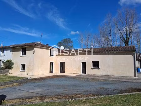 bien avec 3 chambres  séjour  cuisine  grd garage