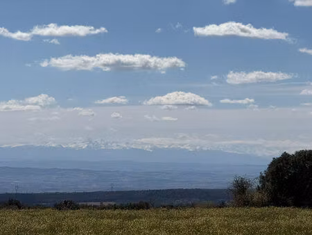 terrain constructible plein sud avec ensemble bâti et vue dégagée sur les pyrénées à villa
