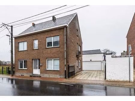 immeuble 2 unités avec jardin et garage – belle opportunité