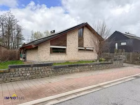 maison 4 façades avec jardin orienté ouest et garage à welle