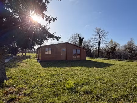 chalet moderne de plain pied et son parc de 6 000m2 avec etang