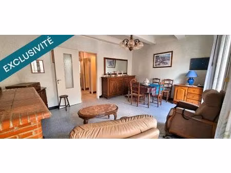 maison à renover avec grand garage et terrasse