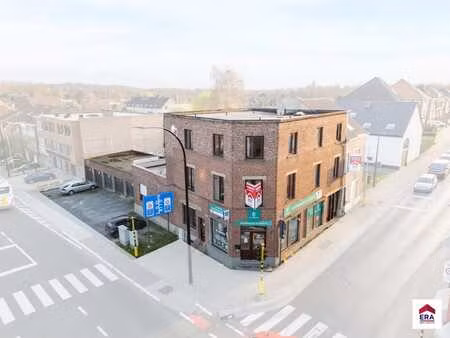 immeuble de rapport avec 3 app  1 bureau et 6 garages