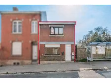 maison divisée en 3 logements