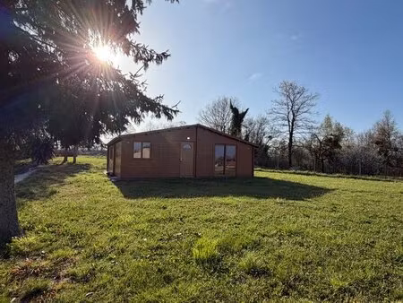 chalet moderne de plain pied et son parc de 6 000m2 avec etang