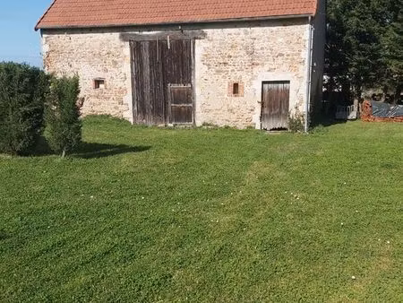 vend terrain plus 2 bâtiments