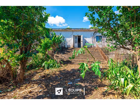 bas de saint françois  maison à rénover sur terrain construc